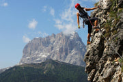 Young woman climbing Wall Mural-Sports-Eazywallz